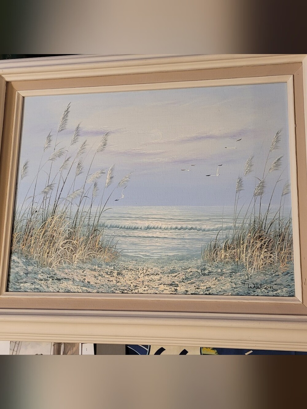 Serene Coastal Beach Scene Wall Art in Soft Blue and Cream
